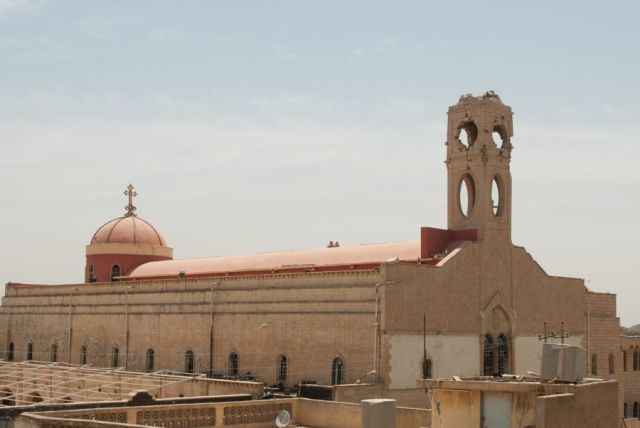 A imagem colocada na torre do Santuário tem um simbolismo: é o renascer da fé na cidade que já foi dominada por jihadistas do Estado Islâmico.