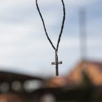 ainda vida de crucifixo em um fio